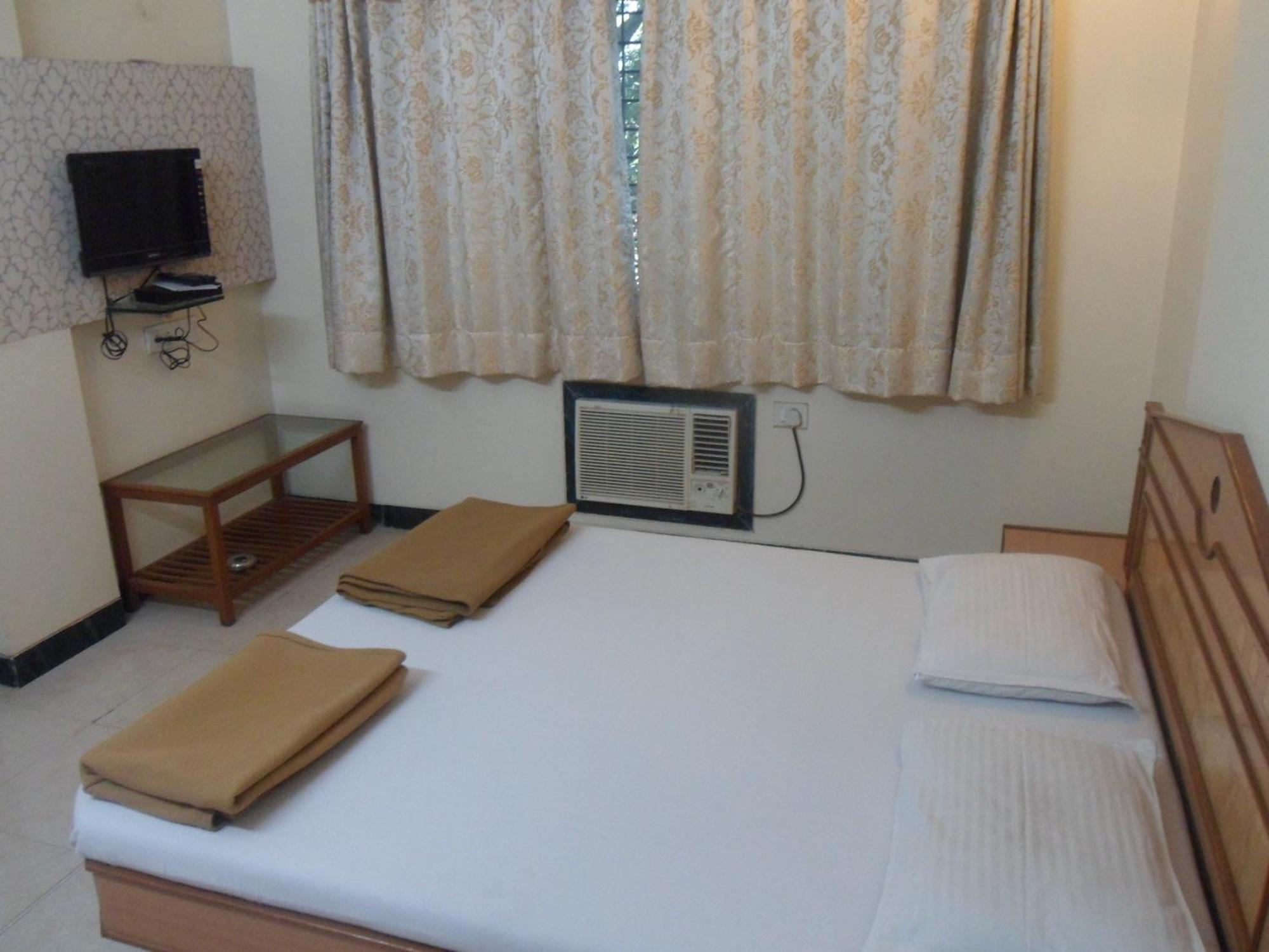 Hotel Pooja International นาสิก ห้อง รูปภาพ
